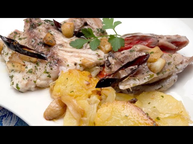 receta de besugo al horno con patatas cebolla y tomate