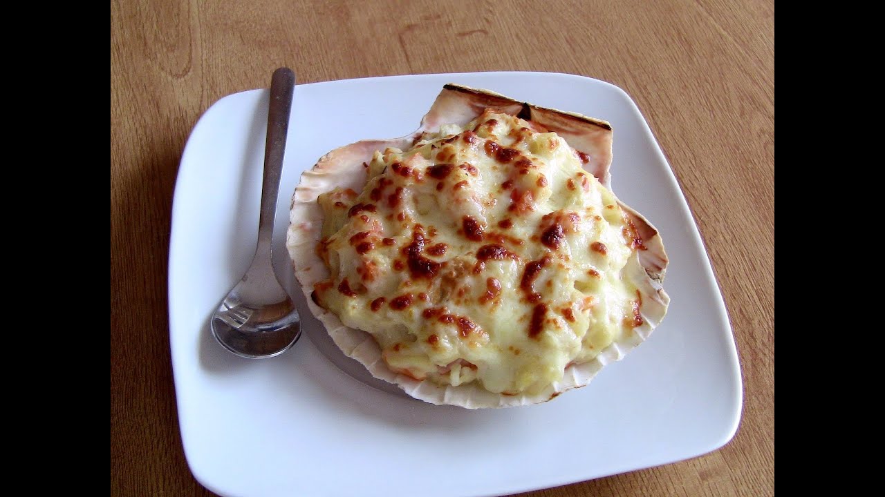 vieiras rellenas de merluza y gambas