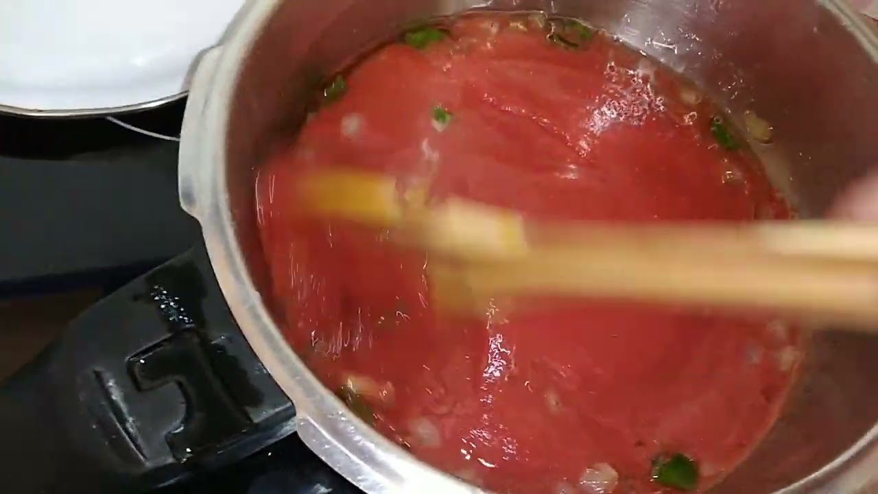 como freír tomate triturado de lata