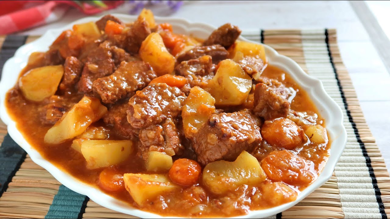 guiso de patatas con guisantes y zanahorias