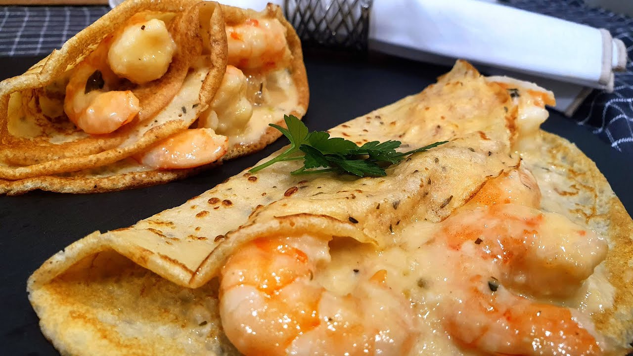 crepes rellenos de langostinos y setas